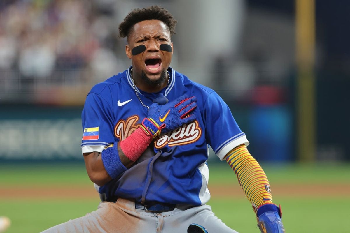 Mar 16, 2026; Miami, FL, United States; Venezuela outfielder Ronald Acuña Jr. (21) reacts after sliding into third base in the seventh inning against Venezuela during a semifinal game of the 2026 World Baseball Classic at loanDepot Park. Mandatory Credit: Sam Navarro-Imagn Images
