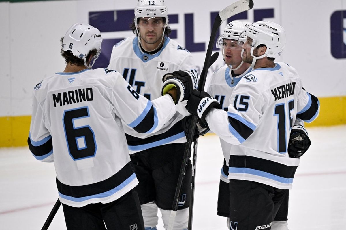 Mar 16, 2026; Dallas, Texas, USA; Utah Mammoth defenseman John Marino (6) and left wing Brandon Tanev (13) and left wing Michael Carcone (53) and center Alexander Kerfoot (15) celebrates a goal scored by Carcone against the Dallas Stars during the third period at the American Airlines Center. Mandatory Credit: Jerome Miron-Imagn Images