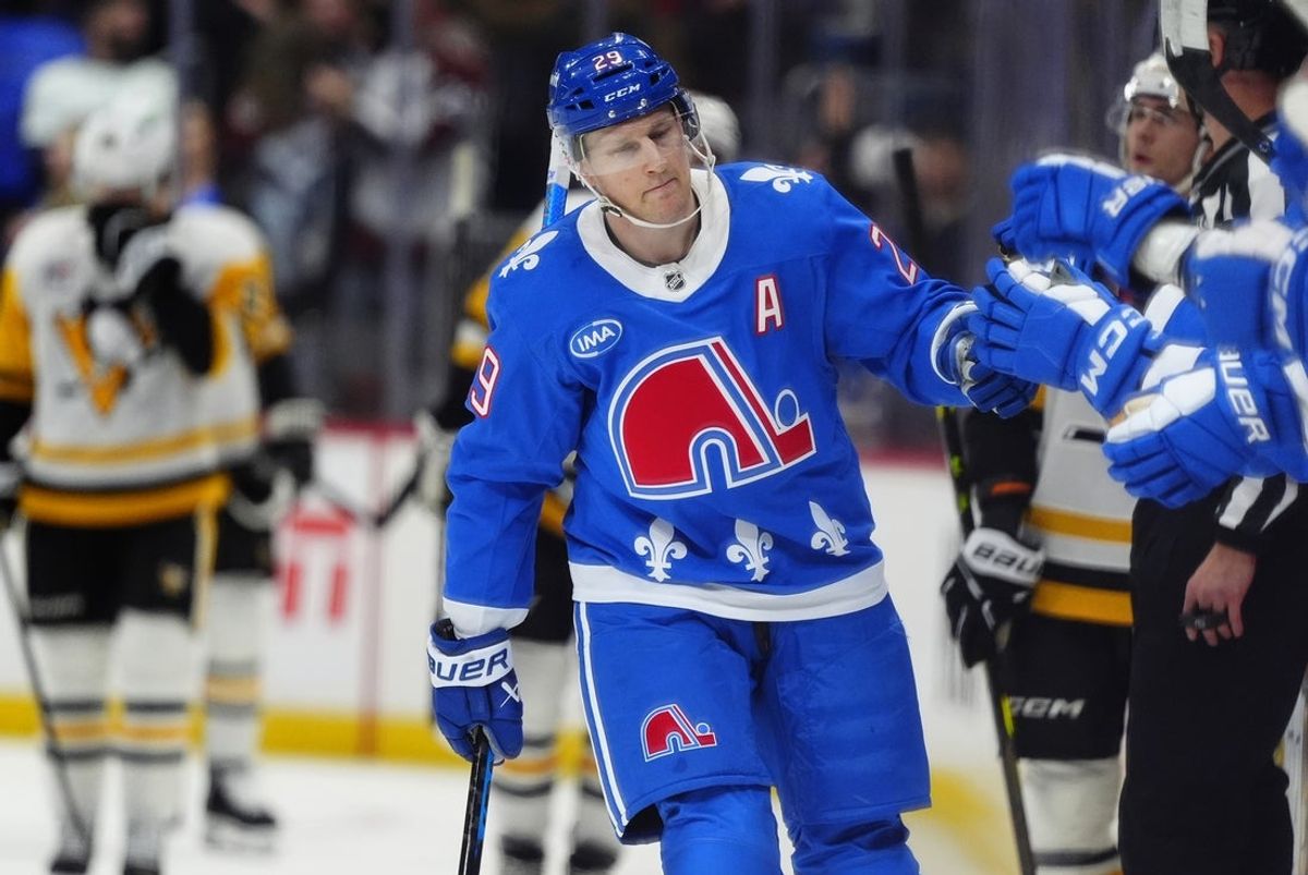 Mar 16, 2026; Denver, Colorado, USA; Colorado Avalanche center Nathan MacKinnon (29) celebrates his goal in the first period against the Pittsburgh Penguins at Ball Arena. Mandatory Credit: Ron Chenoy-Imagn Images