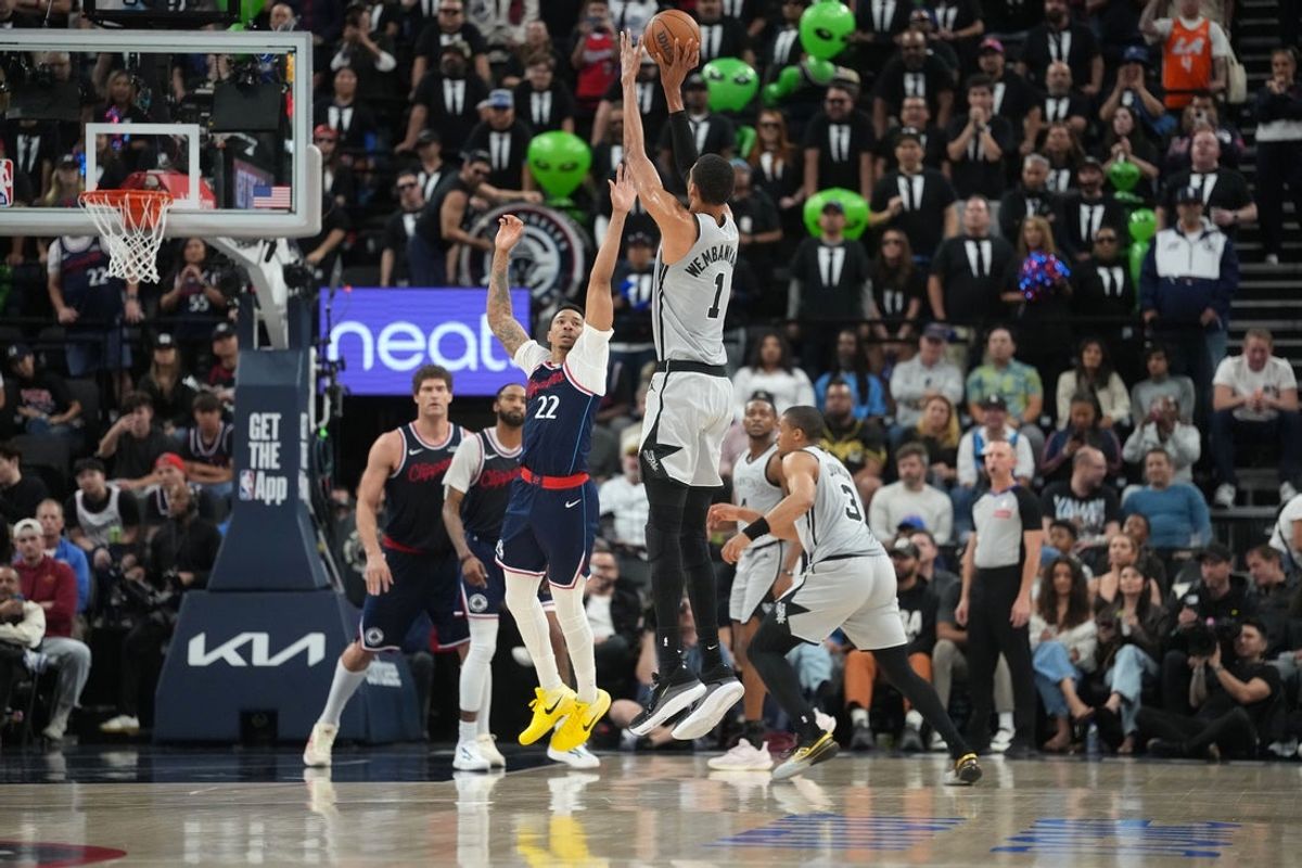 Mar 16, 2026; Inglewood, California, USA; San Antonio Spurs forward Victor Wembanyama (1) shoots the ball against LA Clippers guard Jordan Miller (22) in the first half at Intuit Dome. Mandatory Credit: Kirby Lee-Imagn Images