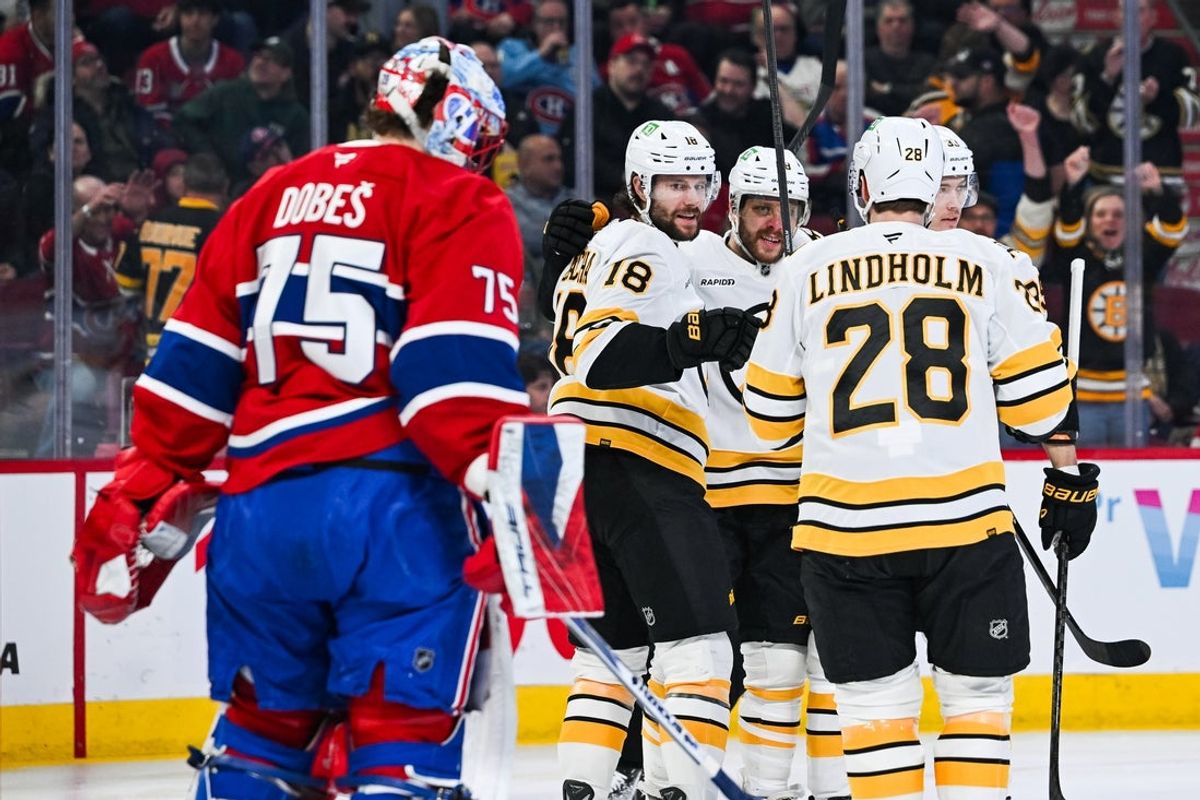 Mar 17, 2026; Montreal, Quebec, CAN; Boston Bruins center Pavel Zacha (18) celebrates with his teammates his goal against Montreal Canadiens goalie Jakub Dobes (75) during the first period at Bell Centre. Mandatory Credit: David Kirouac-Imagn Images