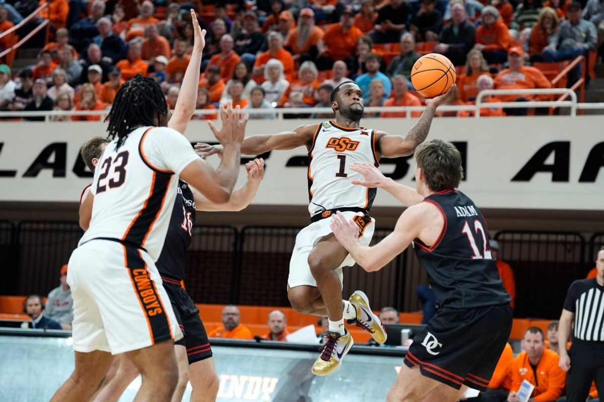 Oklahoma State Cowboys guard Kanye Clary (1) puts up a shot during a first-round basketball game in the National Invitational between the Oklahoma State Cowboys and the Davidson Wildcats at Gallagher-Iba Arena in Stillwater, Okla., Tuesday, March 17, 2026. Oklahoma State won 84-80.