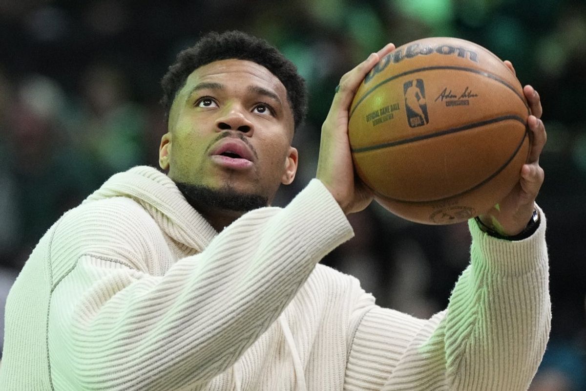 Mar 17, 2026; Milwaukee, Wisconsin, USA; Milwaukee Bucks forward Giannis Antetokounmpo (34) takes a couple of shots during a time out against the Cleveland Cavaliers in the first half at Fiserv Forum. Mandatory Credit: Michael McLoone-Imagn Images