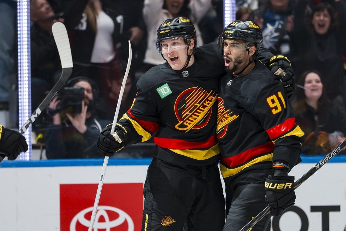 Mar 17, 2026; Vancouver, British Columbia, CAN; Vancouver Canucks forward Aatu Raty (54) and forward Evander Kane (91) celebrate Raty’s goal against the Florida Panthers in the second period at Rogers Arena. Mandatory Credit: Bob Frid-Imagn Images