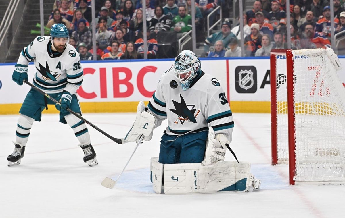 Mar 17, 2026; Edmonton, Alberta, CAN; San Jose Sharks defenseman Mario Ferraro (38) looks on as goaltender Alex Nedeljkovic (33) blocks a shot from the Edmonton Oilers during the third period at Rogers Place. Mandatory Credit: Walter Tychnowicz-Imagn Images