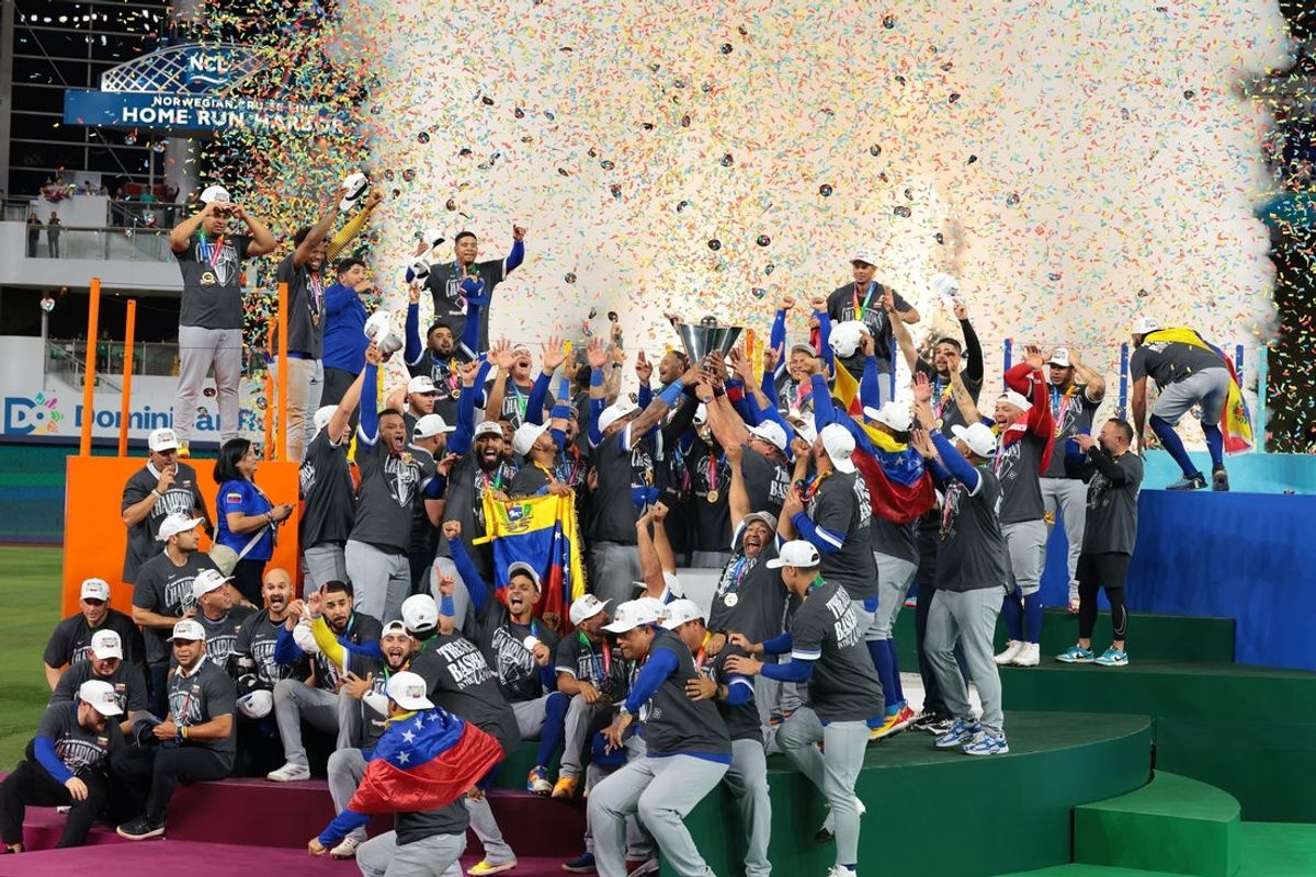 Mar 17, 2026; Miami, FL, United States; Venezuela reacts on the stage after defeating the United States during the 2026 World Baseball Classic Championship game at loanDepot Park. Mandatory Credit: Sam Navarro-Imagn Images