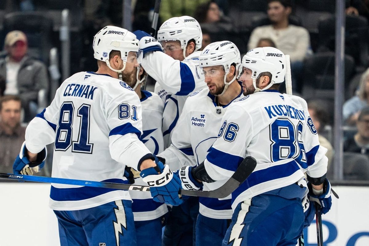 Mar 17, 2026; Seattle, Washington, USA; Tampa Bay Lightning defenseman Erik Cernak (81), defenseman Victor Hedman (77), middle, forward Anthony Cirelli (71), second from right, and forward Nikita Kucherov (86) celebrate a goal during the third period at Climate Pledge Arena. Mandatory Credit: Stephen Brashear-Imagn Images