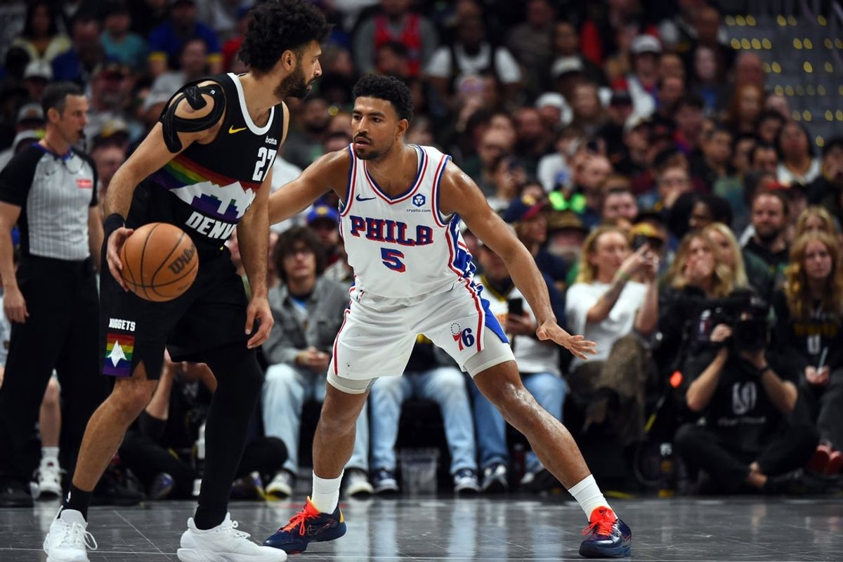 Mar 17, 2026; Denver, Colorado, USA; Denver Nuggets guard Jamal Murray (27) handles the ball as he is defended by Philadelphia 76ers guard Quentin Grimes (5) during the second half at Ball Arena. Mandatory Credit: Christopher Hanewinckel-Imagn Images