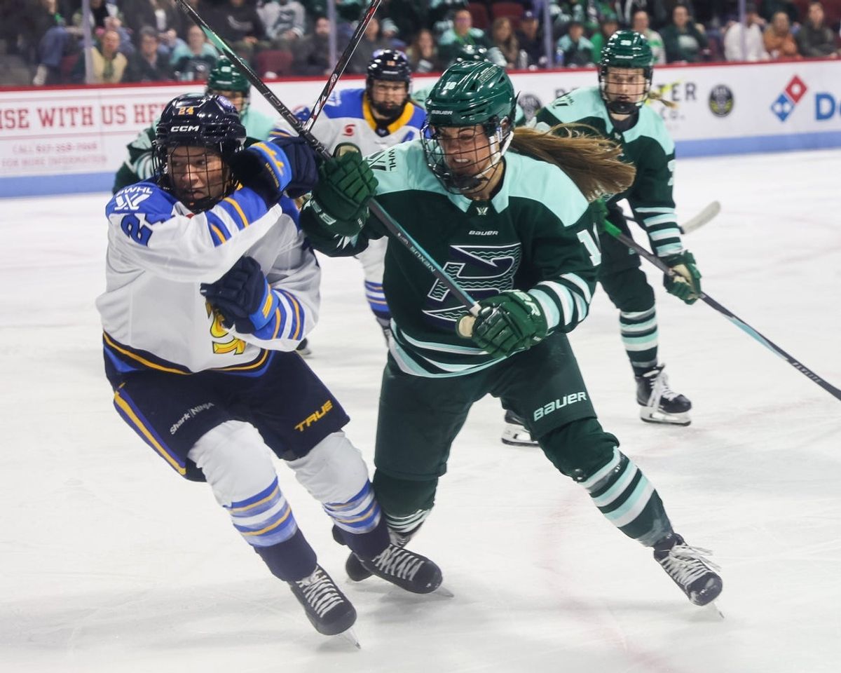 Boston Fleet's Riley Brengman battles Toronto's Natalie Spooner for the puck during a game at Agganis Arena at Boston University on Tuesday, March 17, 2026.