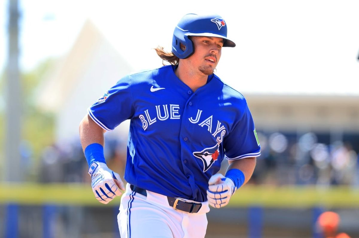 Mar 18, 2026; Dunedin, Florida, USA;  Toronto Blue Jays right fielder Addison Barger (47) hits a home run during the second inning against the Baltimore Orioles at TD Ballpark. Mandatory Credit: Kim Klement Neitzel-Imagn Images