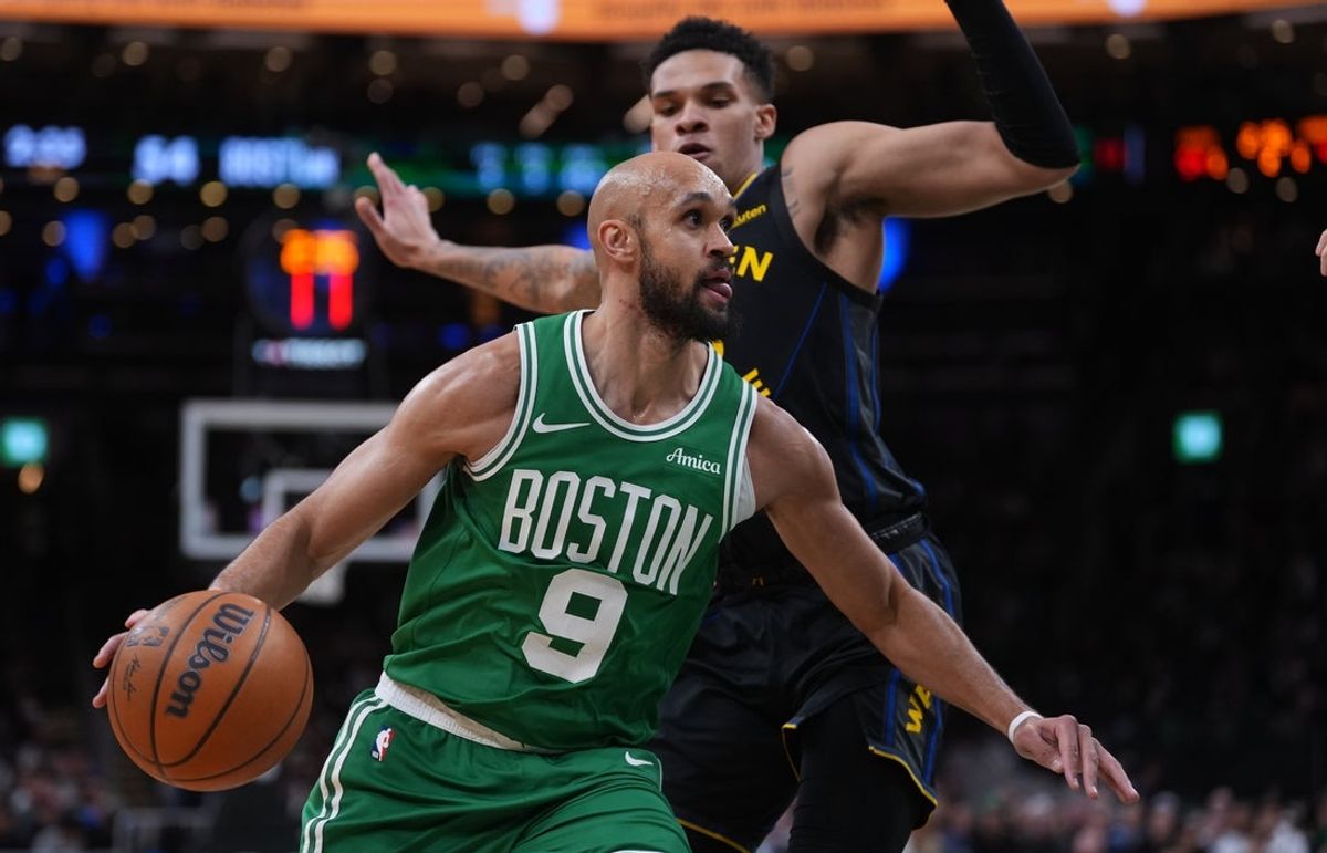 Mar 18, 2026; Boston, Massachusetts, USA; Boston Celtics guard Derrick White (9) drives the ball against Golden State Warriors guard Will Richard (3) in the second quarter at TD Garden. Mandatory Credit: David Butler II-Imagn Images