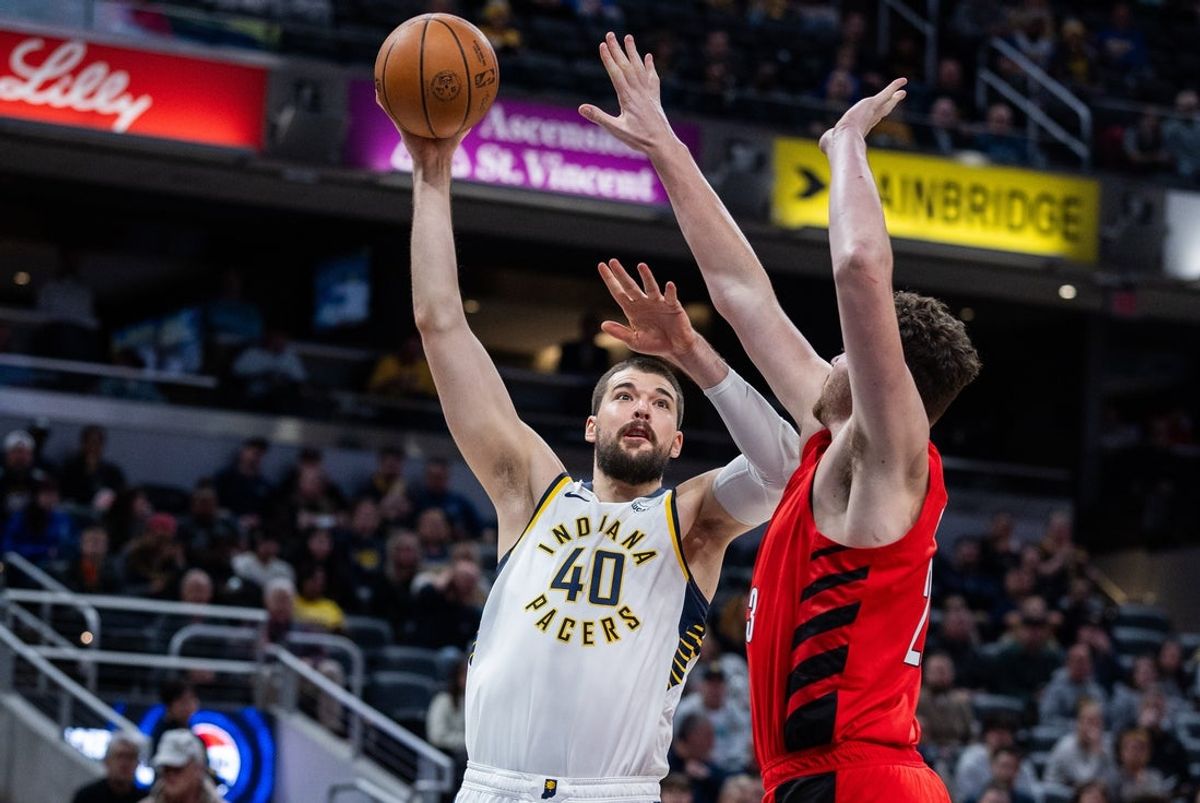 Mar 18, 2026; Indianapolis, Indiana, USA; Indiana Pacers center Ivica Zubac (40) shoots the ball as Portland Trail Blazers center Donovan Clingan (23) defends in the first half at Gainbridge Fieldhouse. Mandatory Credit: Trevor Ruszkowski-Imagn Images