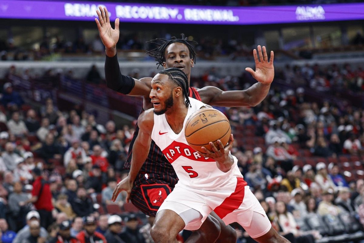 Mar 18, 2026; Chicago, Illinois, USA; Toronto Raptors guard Immanuel Quickley (5) drives to the basket against the Chicago Bulls during the first half at United Center. Mandatory Credit: Kamil Krzaczynski-Imagn Images