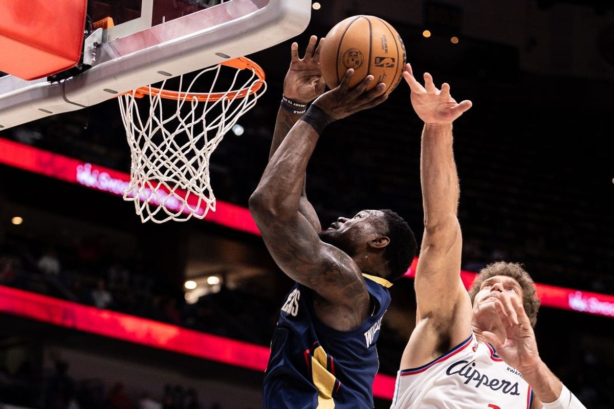 Mar 18, 2026; New Orleans, Louisiana, USA;  New Orleans Pelicans forward Zion Williamson (1) drives to the basket against LA Clippers center Brook Lopez (11) during first half at Smoothie King Center. Mandatory Credit: Stephen Lew-Imagn Images