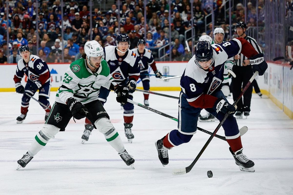 Mar 18, 2026; Denver, Colorado, USA; Colorado Avalanche defenseman Cale Makar (8) controls the puck ahead of Dallas Stars center Mavrik Bourque (22) in the first period at Ball Arena. Mandatory Credit: Isaiah J. Downing-Imagn Images