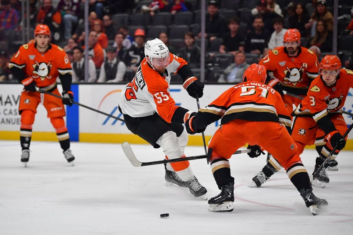 Mar 18, 2026; Anaheim, California, USA; Philadelphia Flyers defenseman Rasmus Ristolainen (55) moves in for a shot against Anaheim Ducks defenseman Olen Zellweger (51) during the first period at Honda Center. Mandatory Credit: Gary A. Vasquez-Imagn Images