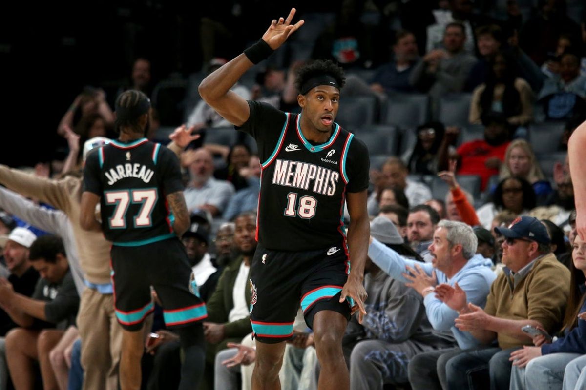 Mar 18, 2026; Memphis, Tennessee, USA; Memphis Grizzlies forward Olivier-Maxence Prosper (18) reacts after a basket during the fourth quarter against the Denver Nuggets at FedExForum. Mandatory Credit: Petre Thomas-Imagn Images