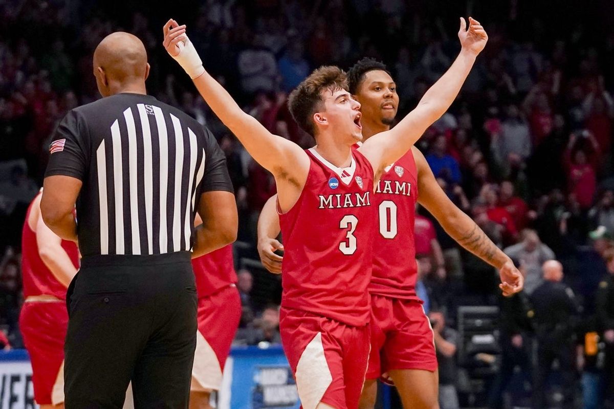 Miami (OH) RedHawks guard Luke Skaljac (3) celebrates at the conclusion of the NCAA Tournament First Four game between the Miami Redhawks and Southern Methodist University Mustangs, Wednesday, March 18, 2026, at University of Dayton Arena in Dayton, Oh. RedHawks won 89-79.