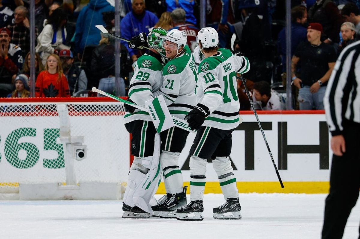 Mar 18, 2026; Denver, Colorado, USA; Dallas Stars goaltender Jake Oettinger (29) celebrates with left wing Jason Robertson (21) and center Oskar Back (10) after the game against the Colorado Avalanche at Ball Arena. Mandatory Credit: Isaiah J. Downing-Imagn Images