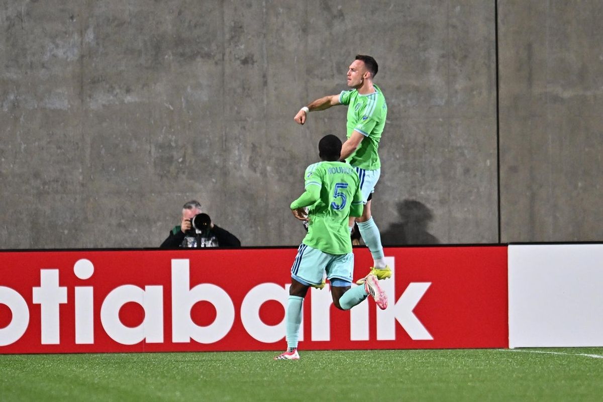 Mar 18, 2026; Spokane, Washington, USA; Seattle Sounders forward Danny Musovski (19) and Seattle Sounders defender Nouhou Tolo (5) celebrate a goal against the Vancouver Whitecaps in the second half Concacaf Champions Cup-Round of 16 at ONE Spokane Stadium. Mandatory Credit: James Snook-Imagn Images