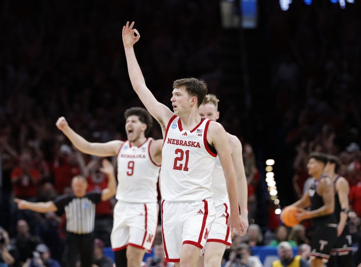 Mar 19, 2026; Oklahoma City, OK, USA; Nebraska Cornhuskers forward Pryce Sandfort (21) reacts during the first half against the Troy Trojans during a first round game of the men's 2026 NCAA Tournament at Paycom Center. Mandatory Credit: Alonzo Adams-Imagn Images