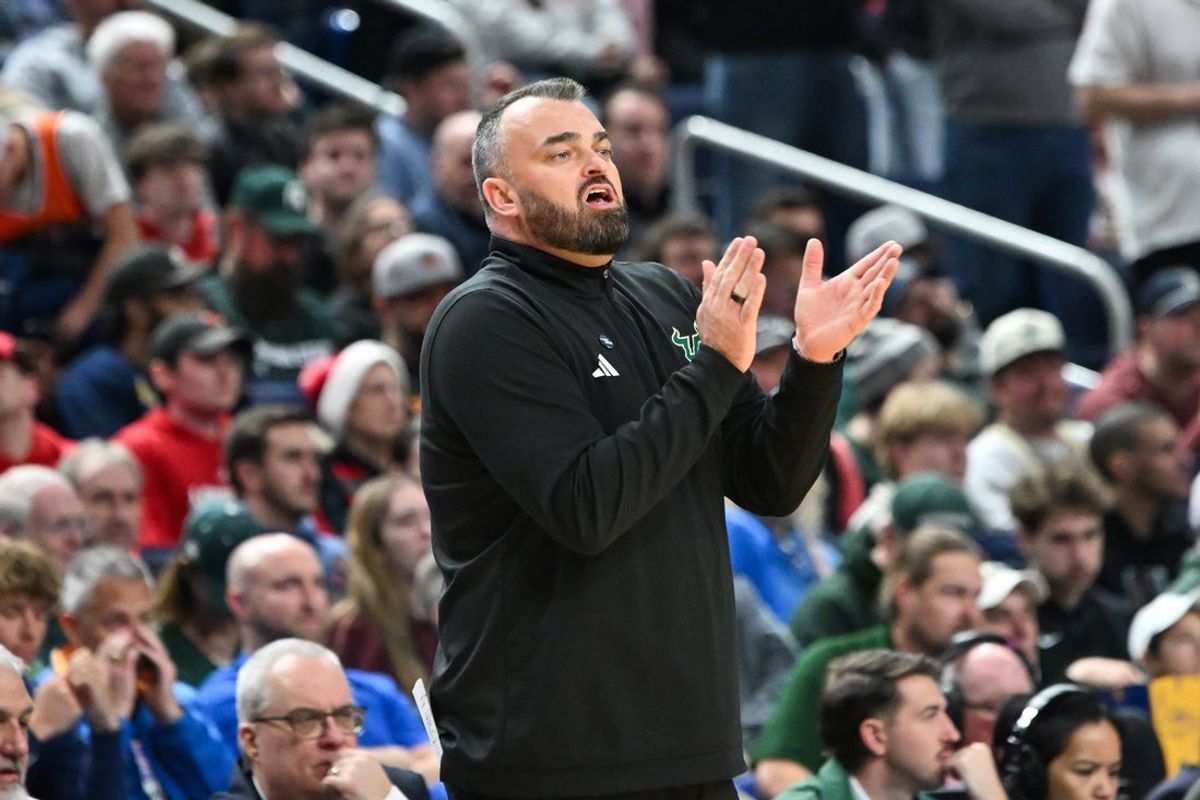 Mar 19, 2026; Buffalo, NY, USA; South Florida Bulls head coach Bryan Hodgson looks on during the second half against the Louisville Cardinals during a first round game of the men's 2026 NCAA Tournament at Keybank Center. Mandatory Credit: Mark Konezny-Imagn Images
