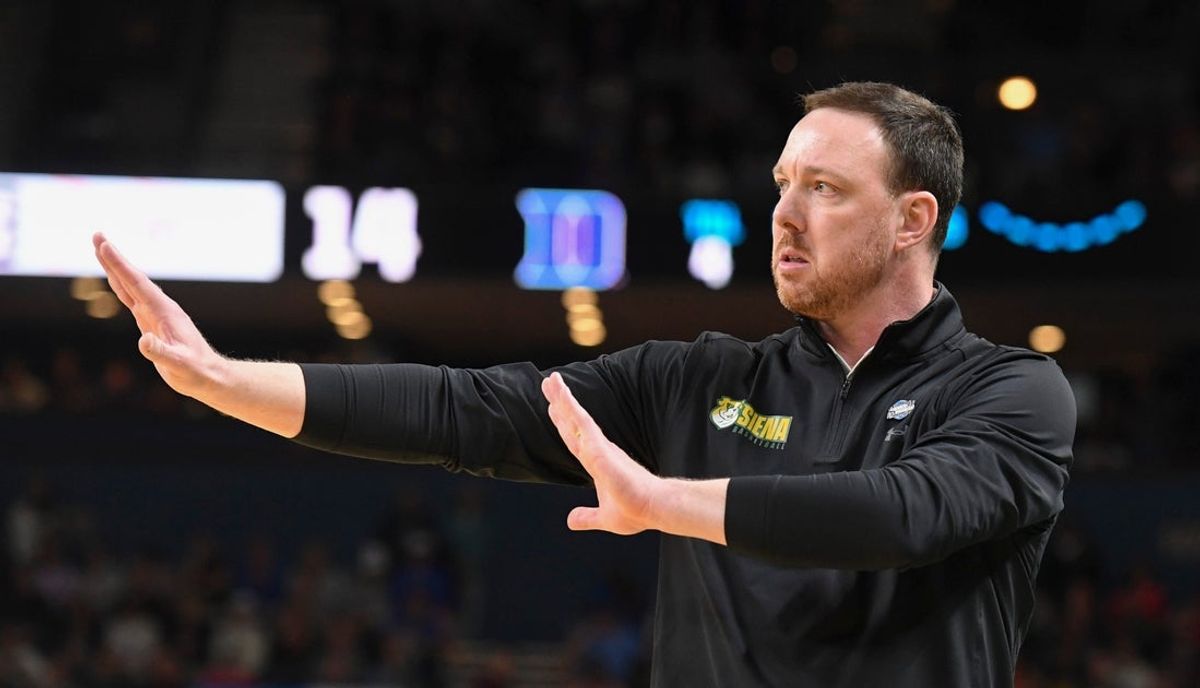 Siena Saints head coach Gerry McNamara calls a play Thursday, March 19, 2026, during the NCAA Men’s Basketball Tournament first round game against the Duke Blue Devils at Bon Secours Wellness Arena in Greenville, South Carolina.