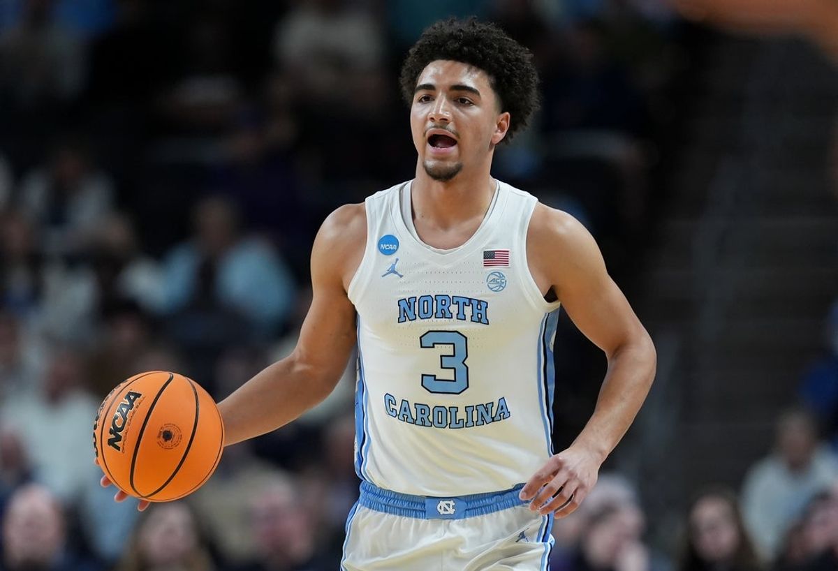 Mar 19, 2026; Greenville, SC, USA; North Carolina Tar Heels guard Derek Dixon (3) dribbles the ball against the VCU Rams in the first half of a first round game of the men's 2026 NCAA Tournament at Bon Secours Wellness Arena. Mandatory Credit: Jim Dedmon-Imagn Images