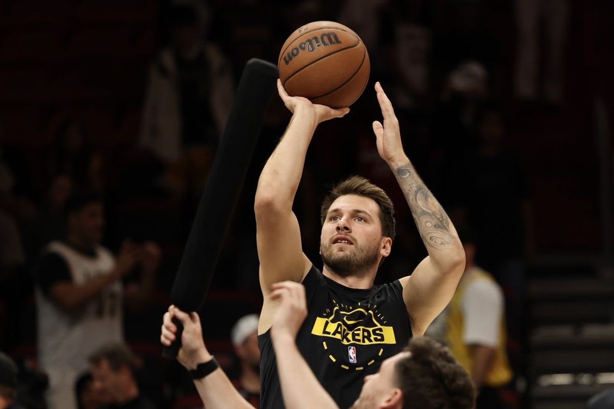 Mar 19, 2026; Miami, Florida, USA; Los Angeles Lakers guard Luka Doncic (77) warms up before tip off against the Miami Heat at Kaseya Center. Mandatory Credit: Isabella Frias-Imagn Images