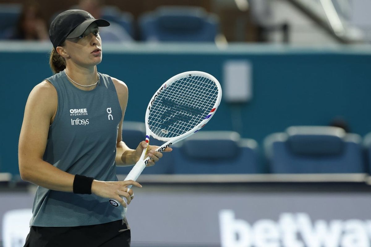 Mar 19, 2026; Miami Gardens, FL, USA; Iga Swiatek (POL) reacts after missing a shot against Magda Linette (POL) (not pictured) on day three of the 2026 Miami Open at Hard Rock Stadium. Mandatory Credit: Geoff Burke-Imagn Images