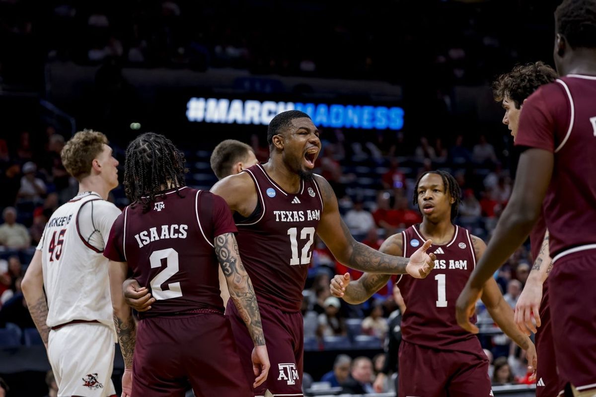 Mar 19, 2026; Oklahoma City, OK, USA; Texas A&M Aggies forward Rashaun Agee (12) celebrates with his team during a first round game of the men's 2026 NCAA Tournament at Paycom Center. Mandatory Credit: Alonzo Adams-Imagn Images