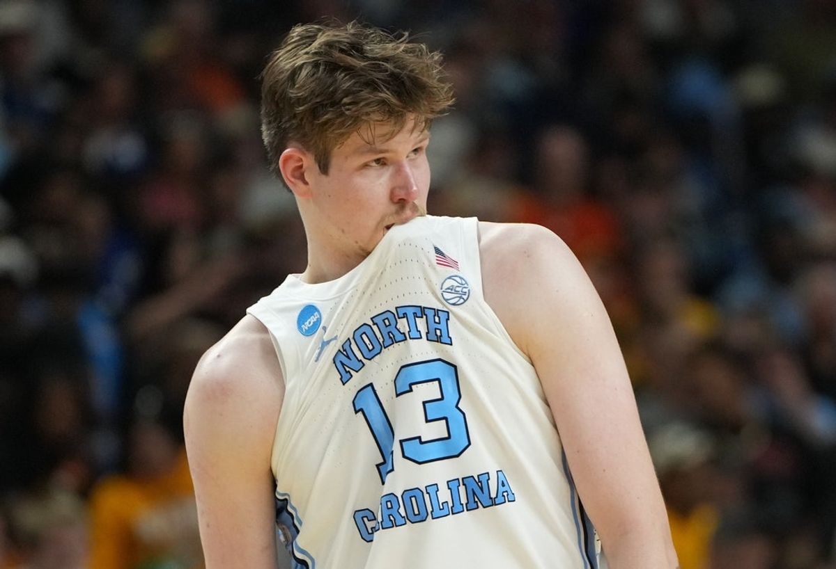 Mar 19, 2026; Greenville, SC, USA; North Carolina Tar Heels center Henri Veesaar (13) bites his jersey against the VCU Rams in the second half of a first round game of the men's 2026 NCAA Tournament at Bon Secours Wellness Arena. Mandatory Credit: Bob Donnan-Imagn Images