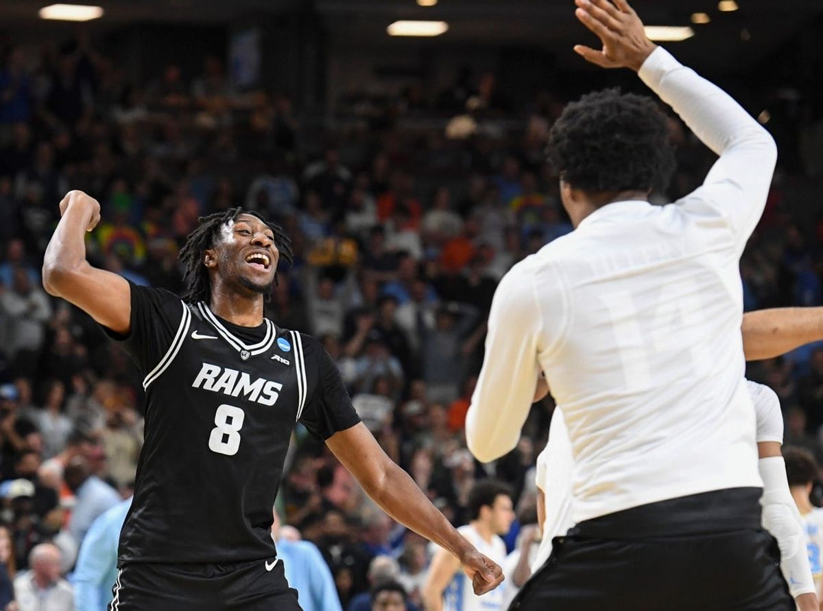 VCU Rams forward Michael Belle (8) celebrates as the game ends Thursday, March 19, 2026, after the NCAA Men’s Basketball Tournament first round game against the North Carolina Tar Heels at Bon Secours Wellness Arena in Greenville, South Carolina. VCU Rams won 82-78 in OT.