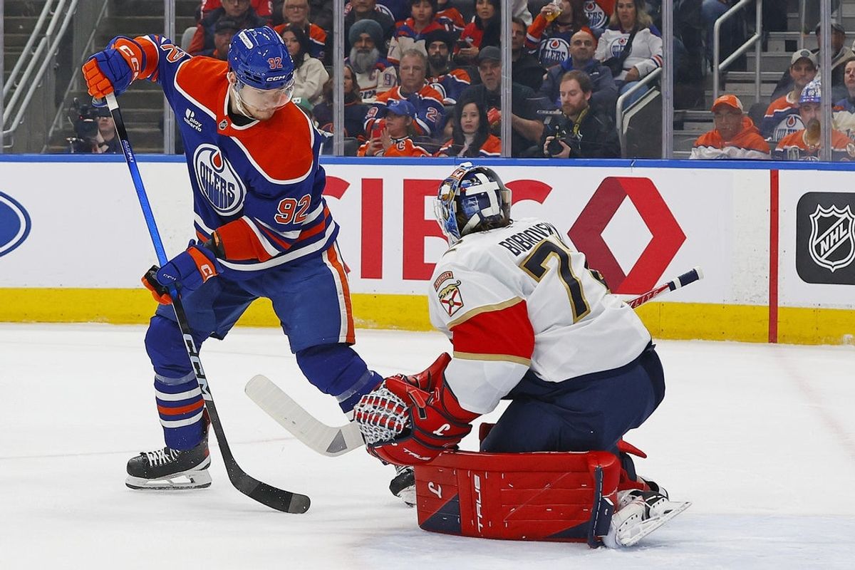 Mar 19, 2026; Edmonton, Alberta, CAN; Edmonton Oilers forward Vasily Podkolzin (92) shoots the puck against Florida Panthers goaltender Sergei Bobrovsky (72) during the first period at Rogers Place. Mandatory Credit: Perry Nelson-Imagn Images
