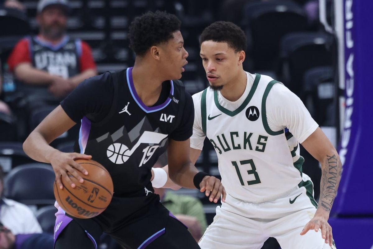 Mar 19, 2026; Salt Lake City, Utah, USA; Utah Jazz guard Ace Bailey (19) dribbles the ball defended by Milwaukee Bucks guard Ryan Rollins (13) during the first half at Delta Center. Mandatory Credit: Rob Gray-Imagn Images