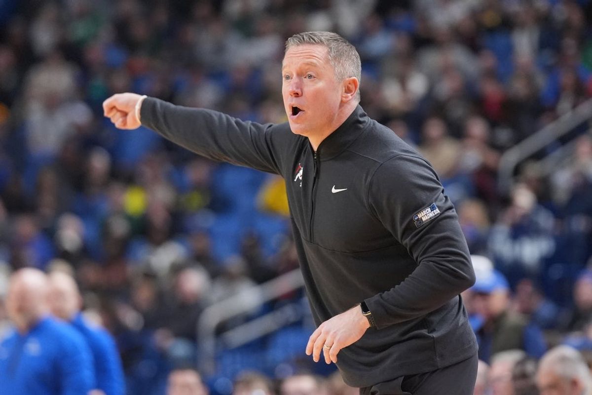 Mar 19, 2026; Buffalo, NY, USA; Georgia Bulldogs head coach Mike White instructs his team against the Saint Louis Billikens during the first half of a first round game of the men's 2026 NCAA Tournament at Keybank Center. Mandatory Credit: Gregory Fisher-Imagn Images