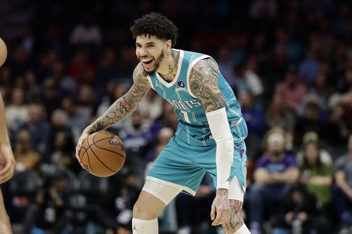 Mar 19, 2026; Charlotte, North Carolina, USA; Charlotte Hornets guard LaMelo Ball (1) smiles as he dribbles the ball during the first quarter against the Orlando Magic at Spectrum Center. Mandatory Credit: Brian Westerholt-Imagn Images