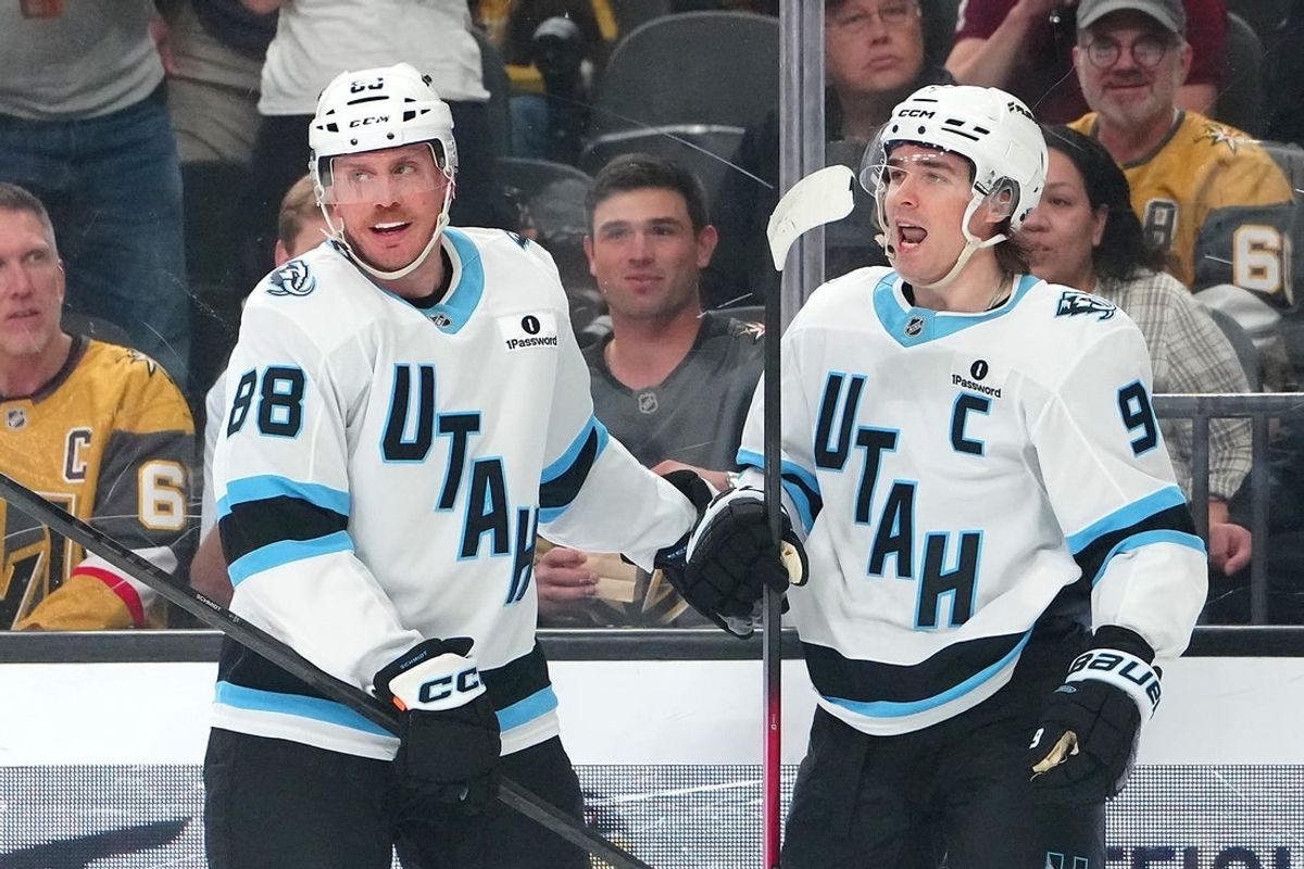 Mar 19, 2026; Las Vegas, Nevada, USA; Utah Mammoth right wing Clayton Keller (9) celebrates with defenseman Nate Schmidt (88) after scoring a goal against the Vegas Golden Knights during the first period at T-Mobile Arena. Mandatory Credit: Stephen R. Sylvanie-Imagn Images