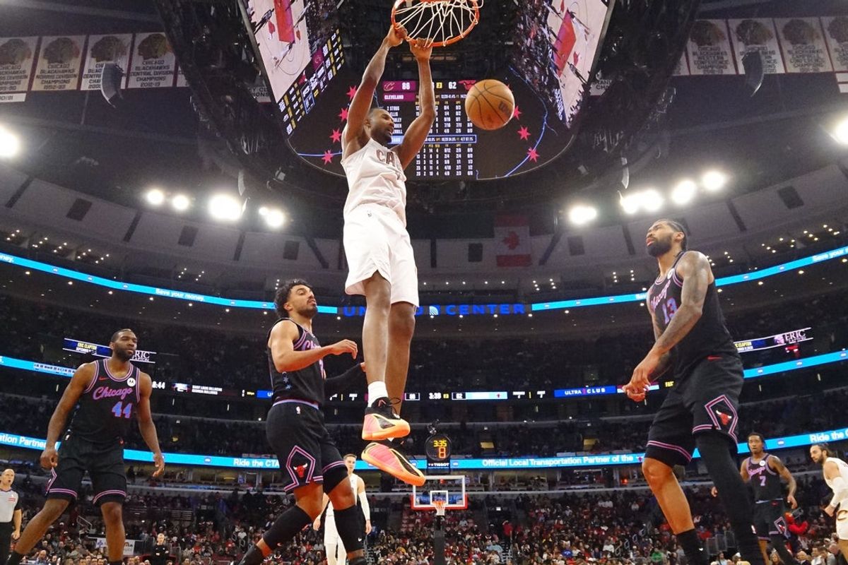 Mar 19, 2026; Chicago, Illinois, USA; Cleveland Cavaliers center Evan Mobley (4) dunks the ball on Chicago Bulls center Nick Richards (13) during the second half at United Center. Mandatory Credit: David Banks-Imagn Images