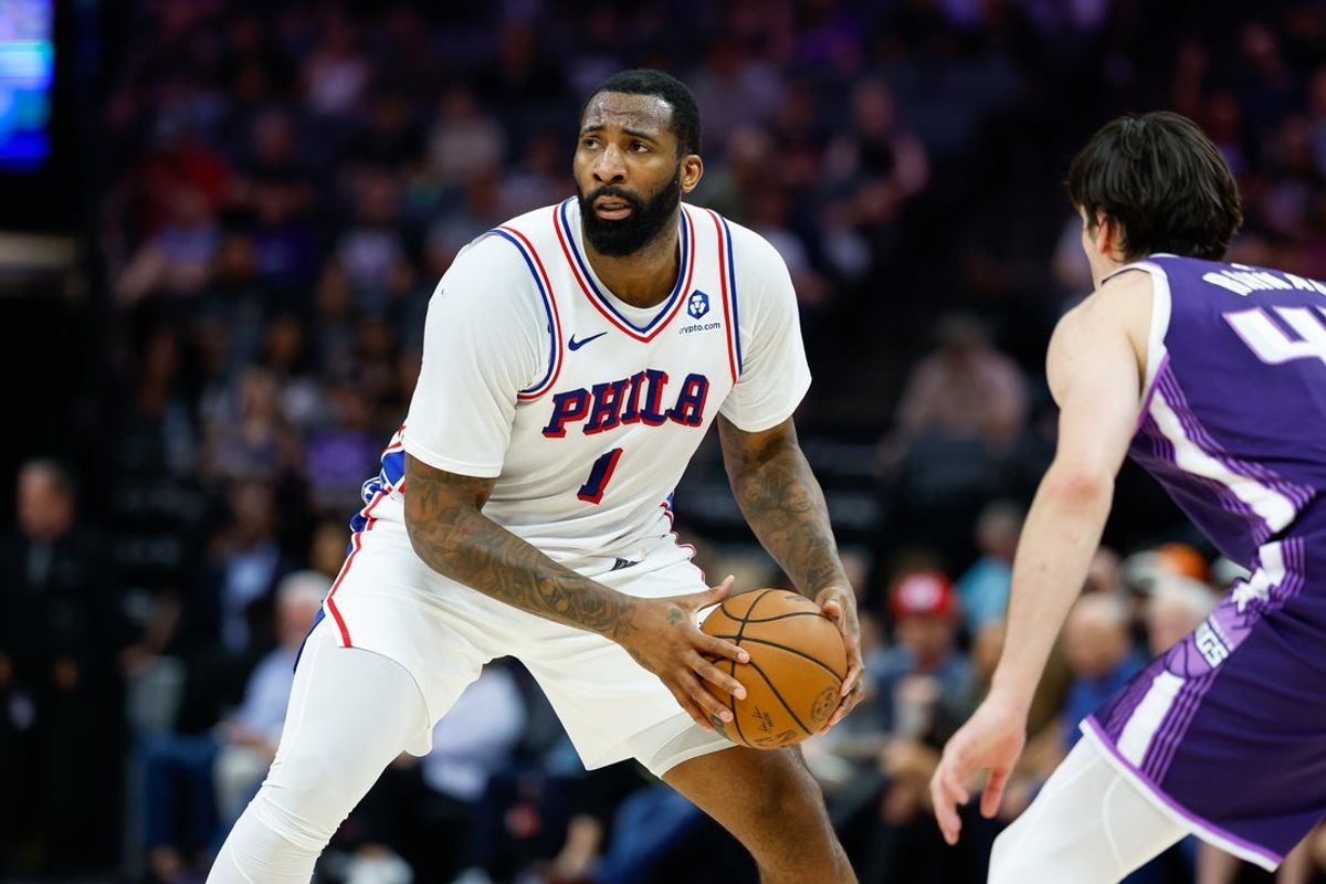 Mar 19, 2026; Sacramento, California, USA; Philadelphia 76ers center Andre Drummond (1) controls the ball against Sacramento Kings center Maxime Raynaud (42) during the second quarter at Golden 1 Center. Mandatory Credit: Sergio Estrada-Imagn Images