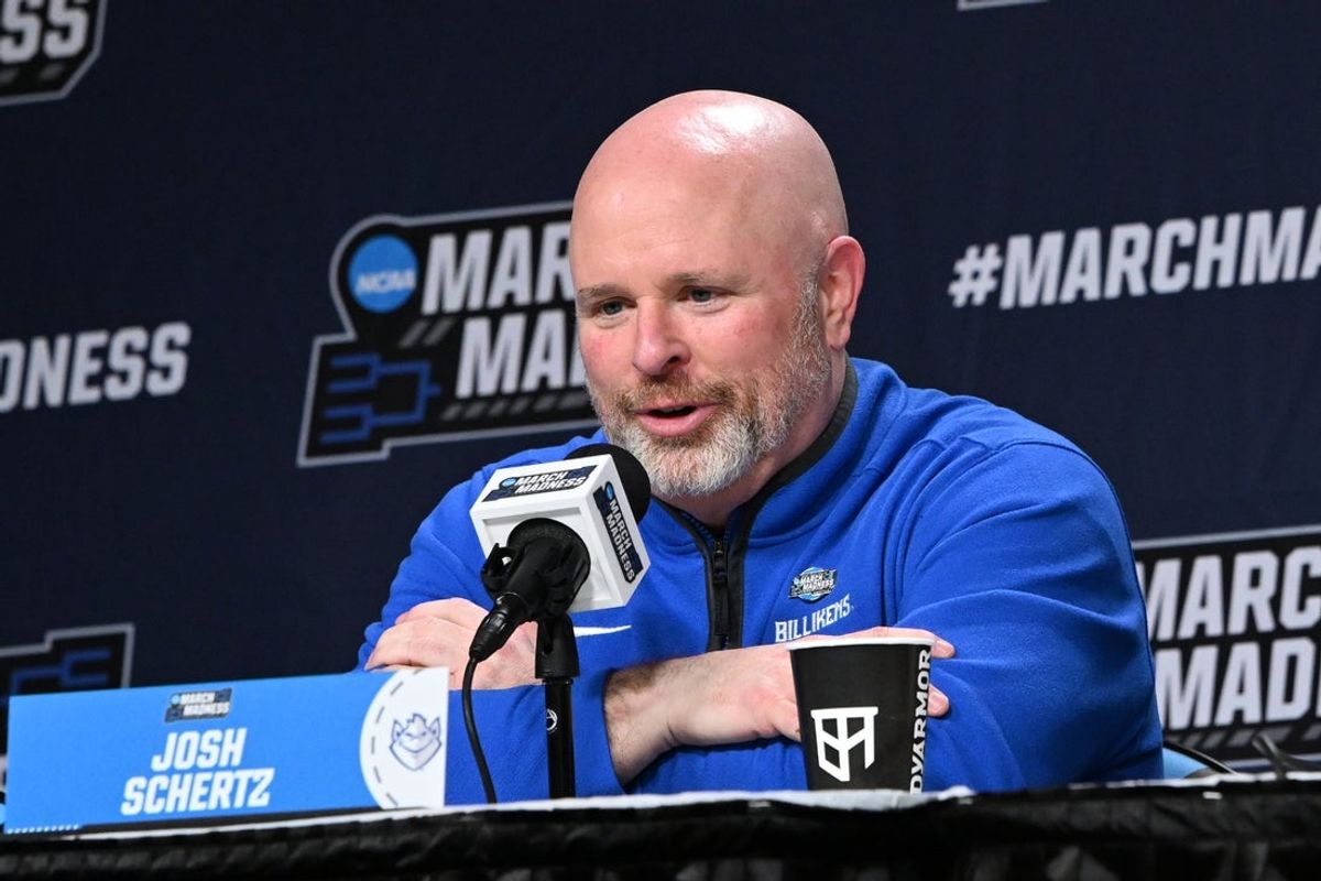 Mar 19, 2026; Buffalo, NY, USA; Saint Louis Billikens head coach Josh Schertz speaks to the media after a first round game of the men's 2026 NCAA Tournament against the Georgia Bulldogs at Keybank Center. Mandatory Credit: Mark Konezny-Imagn Images