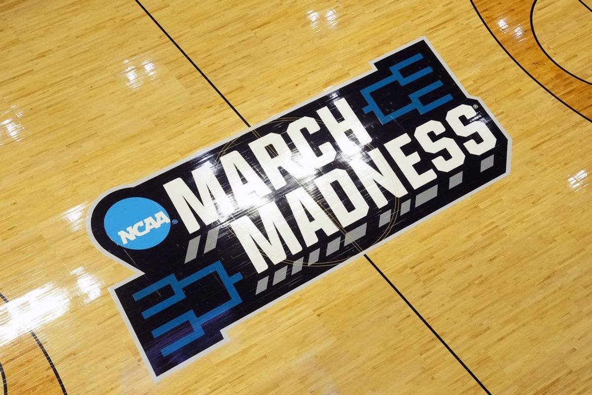 Mar 20, 2026; San Diego, CA, USA; The March Madness logo on the court during a first round game of the men's 2026 NCAA Tournament at Viejas Arena. Mandatory Credit: Kirby Lee-Imagn Images
