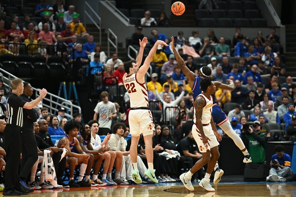 Mar 20, 2026; St. Louis, MO, USA; Iowa State Cyclones forward Milan Momcilovic (22) shoots a three point shot against the Tennessee State Tigers during the first half of a first round game of the men's 2026 NCAA Tournament at Enterprise Center. Mandatory Credit: Jeff Le-Imagn Images