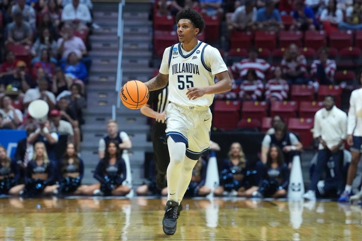 Mar 20, 2026; San Diego, CA, USA; Villanova Wildcats guard Acaden Lewis (55) controls the ball against the Utah State Aggies in the second half during a first round game of the men's 2026 NCAA Tournament at Viejas Arena. Mandatory Credit: Kirby Lee-Imagn Images