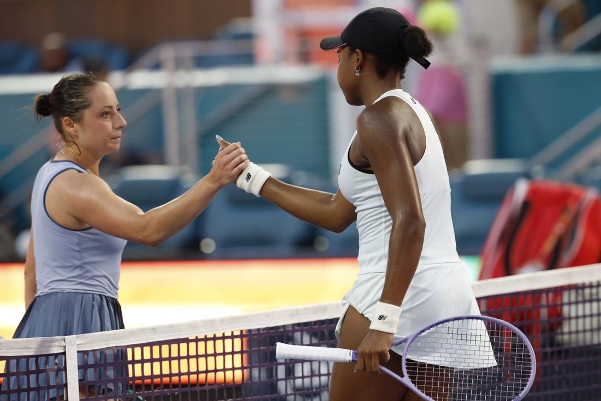 Mar 20, 2026; Miami Gardens, FL, USA; Coco Gauff (USA) (R) shakes hands with Elisabetta Cocciaretto (ITA) (L) at the net after their match on day four of the 2026 Miami Open at Hard Rock Stadium. Mandatory Credit: Geoff Burke-Imagn Images