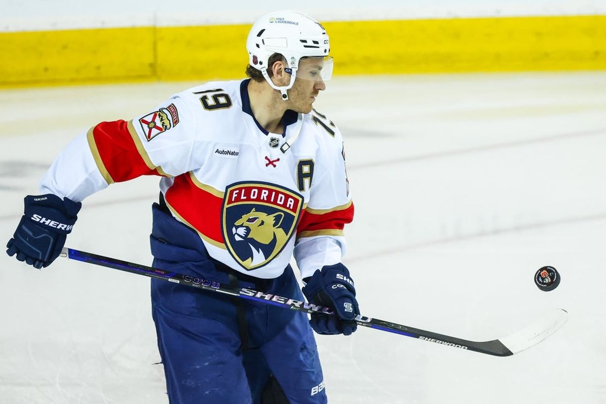 Mar 20, 2026; Calgary, Alberta, CAN; Florida Panthers left wing Matthew Tkachuk (19) controls the puck during the warmup period against the Calgary Flames at Scotiabank Saddledome. Mandatory Credit: Sergei Belski-Imagn Images