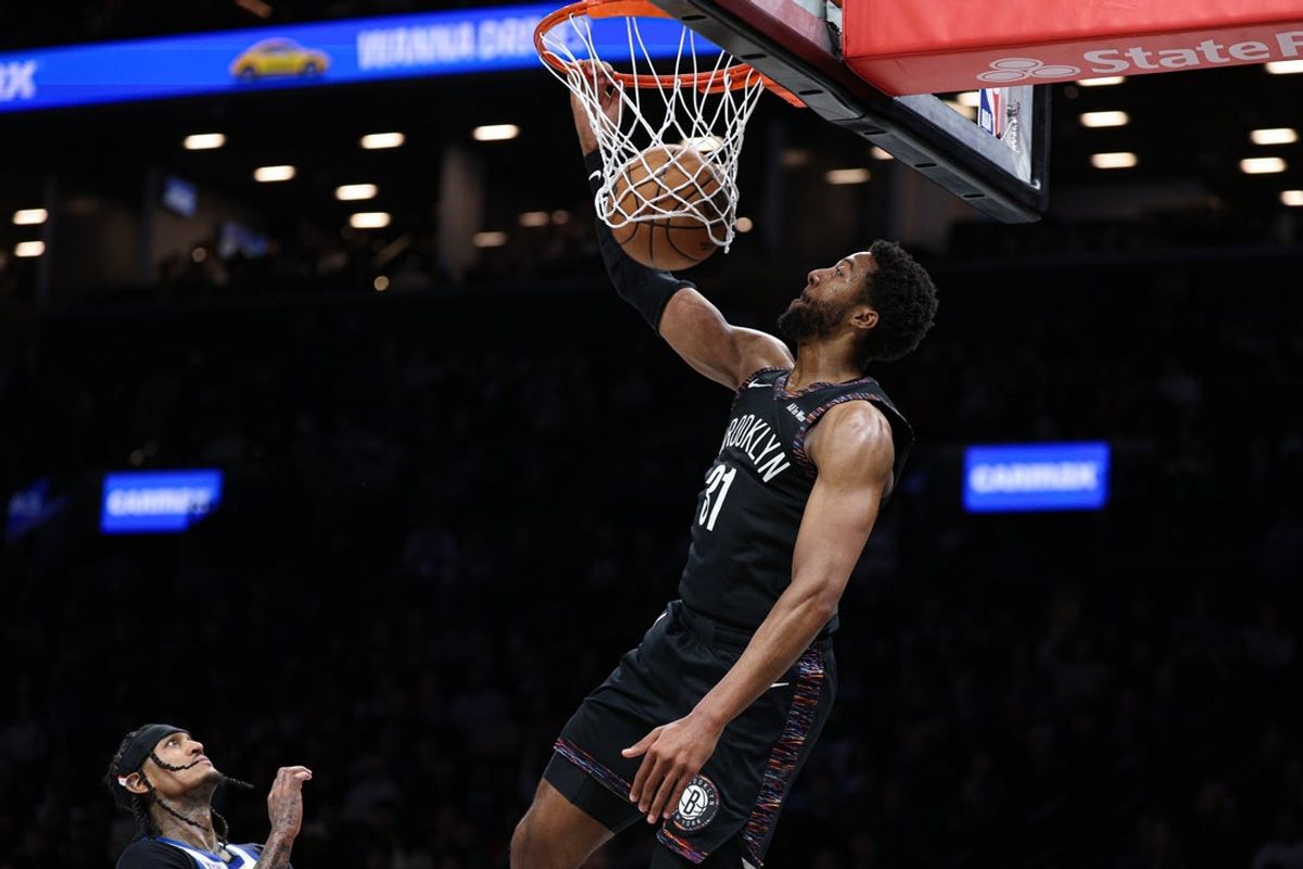 Mar 20, 2026; Brooklyn, New York, USA; Brooklyn Nets forward Chaney Johnson (31) dunks the ball during the second half against the New York Knicks at Barclays Center. Mandatory Credit: Vincent Carchietta-Imagn Images