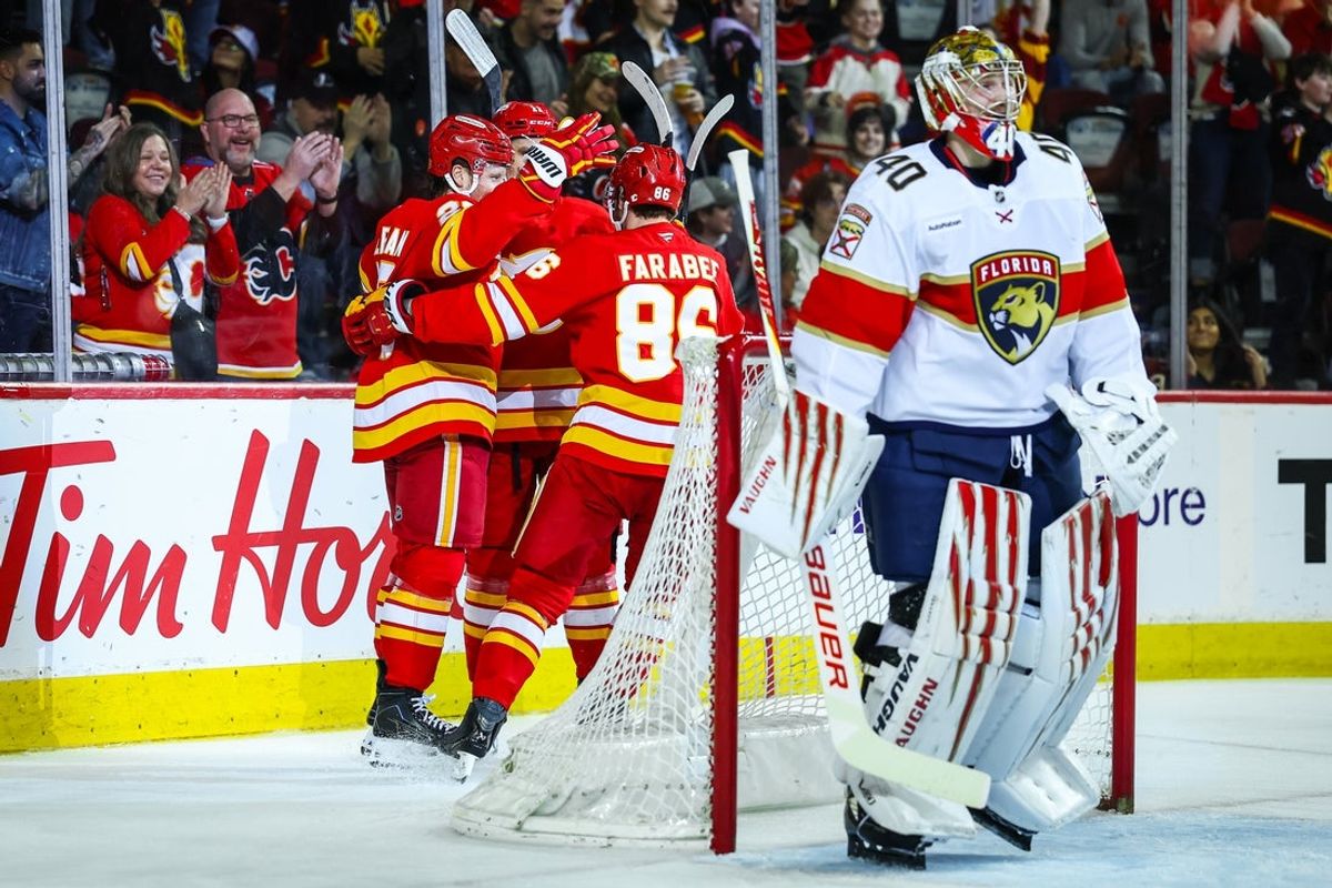 Mar 20, 2026; Calgary, Alberta, CAN; Calgary Flames left wing Joel Farabee (86) celebrates his goal against Florida Panthers goaltender Daniil Tarasov (40) during the second period at Scotiabank Saddledome. Mandatory Credit: Sergei Belski-Imagn Images