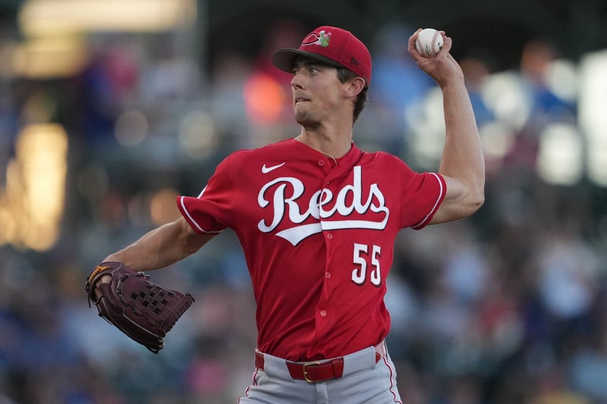Mar 20, 2026; Mesa, Arizona, USA; Cincinnati Reds pitcher Brandon Williamson (55) throws against the Chicago Cubs in the first inning at Sloan Park. Mandatory Credit: Rick Scuteri-Imagn Images