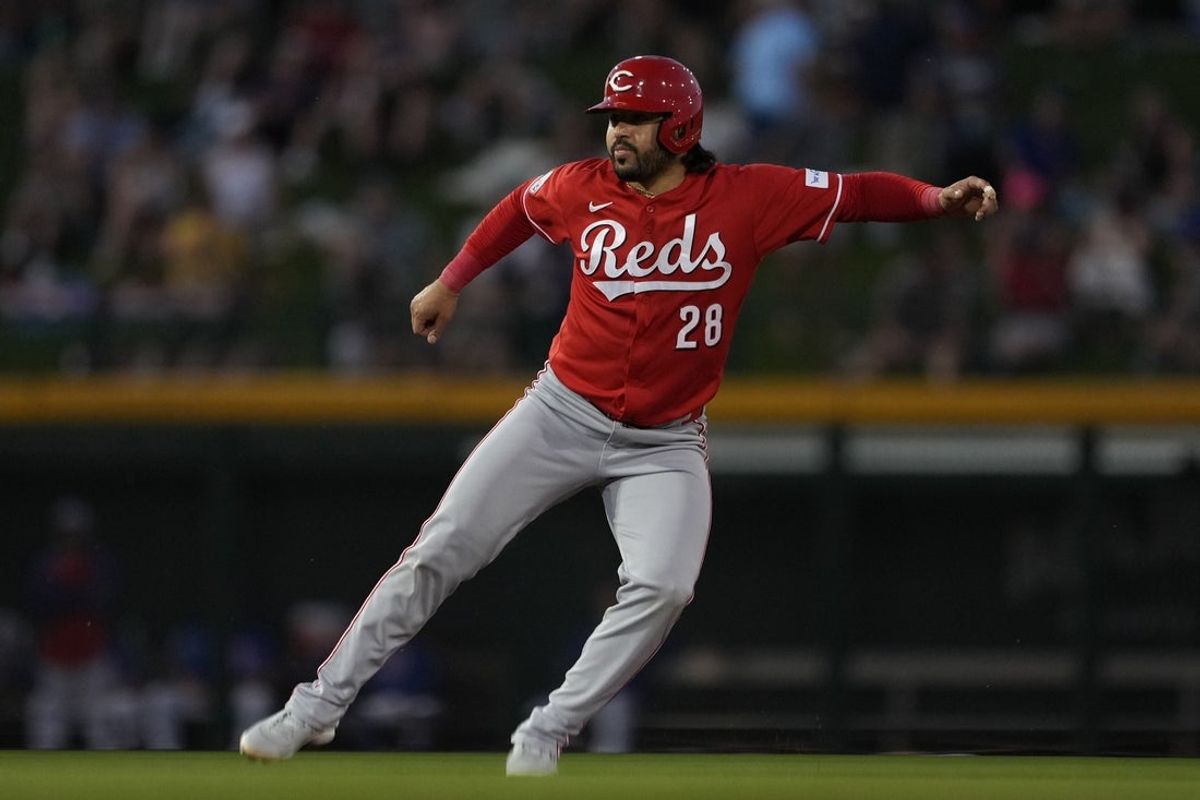 Mar 20, 2026; Mesa, Arizona, USA; Cincinnati Reds third baseman Eugenio Suarez (28) leads off against the Chicago Cubs in the third inning at Sloan Park. Mandatory Credit: Rick Scuteri-Imagn Images